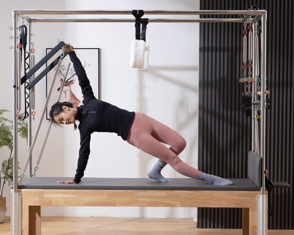 Oak Pilates Cadillac Trapeze.jpg